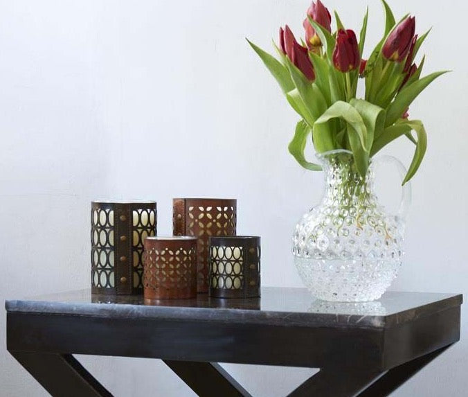 Shikari Geometric candle set on table with hobnail jug